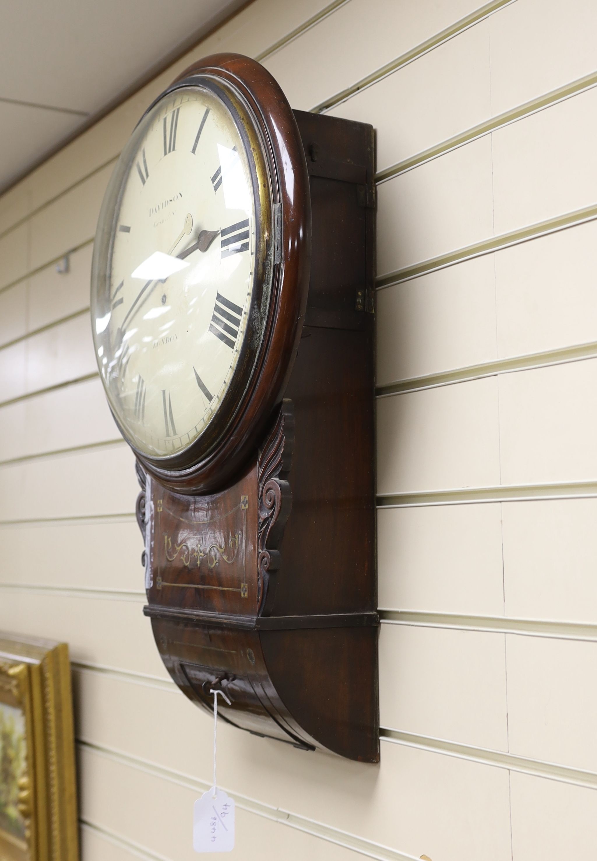 Davidson of London. A William IV brass inset mahogany drop dial wall timepiece